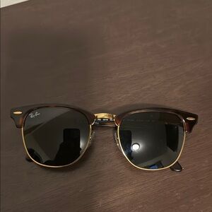 Ray-Ban Black and Gold Sunglasses Timeless Design
